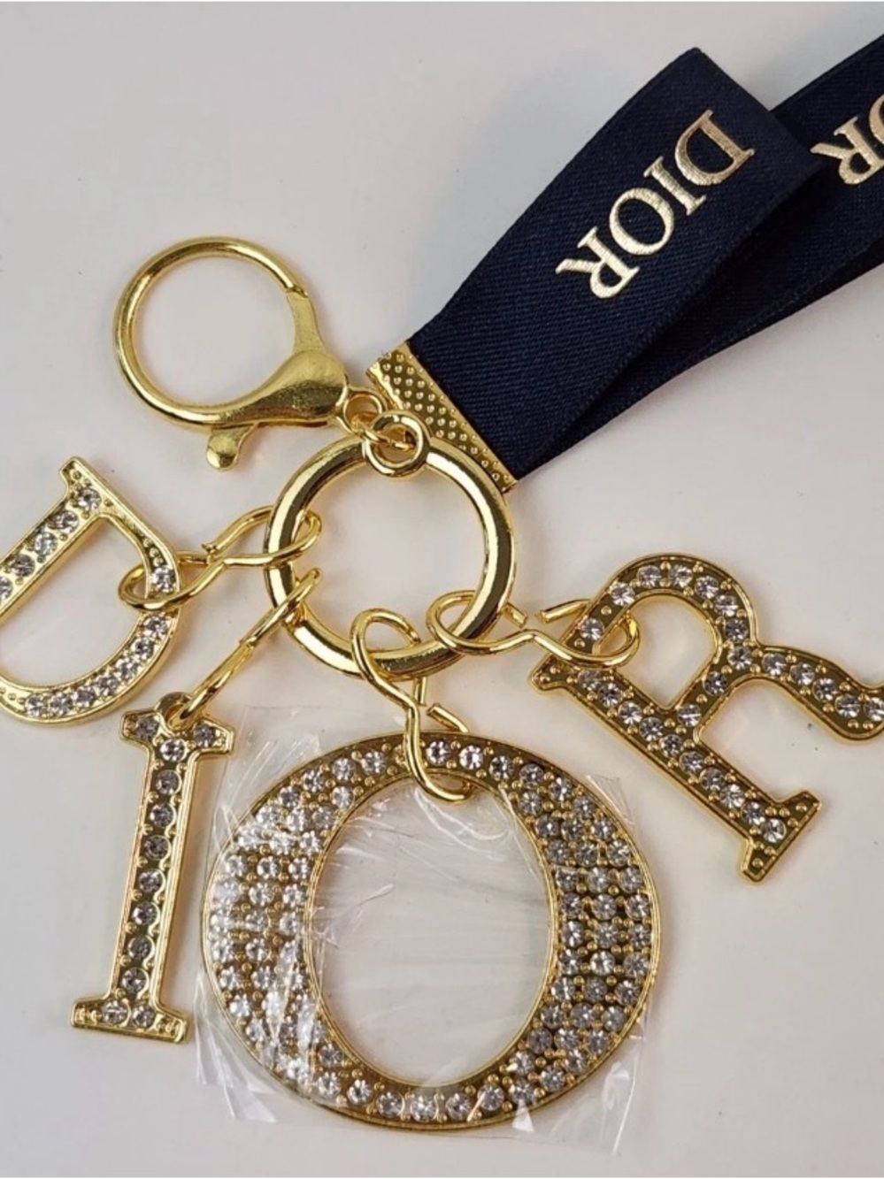 New Dior Gold Crystal Letter Charm Keyring with Navy Dior Ribbon